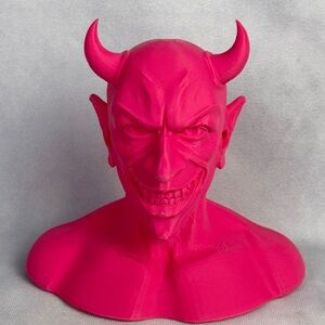 Vibrant Pink Devil Head Sculpture